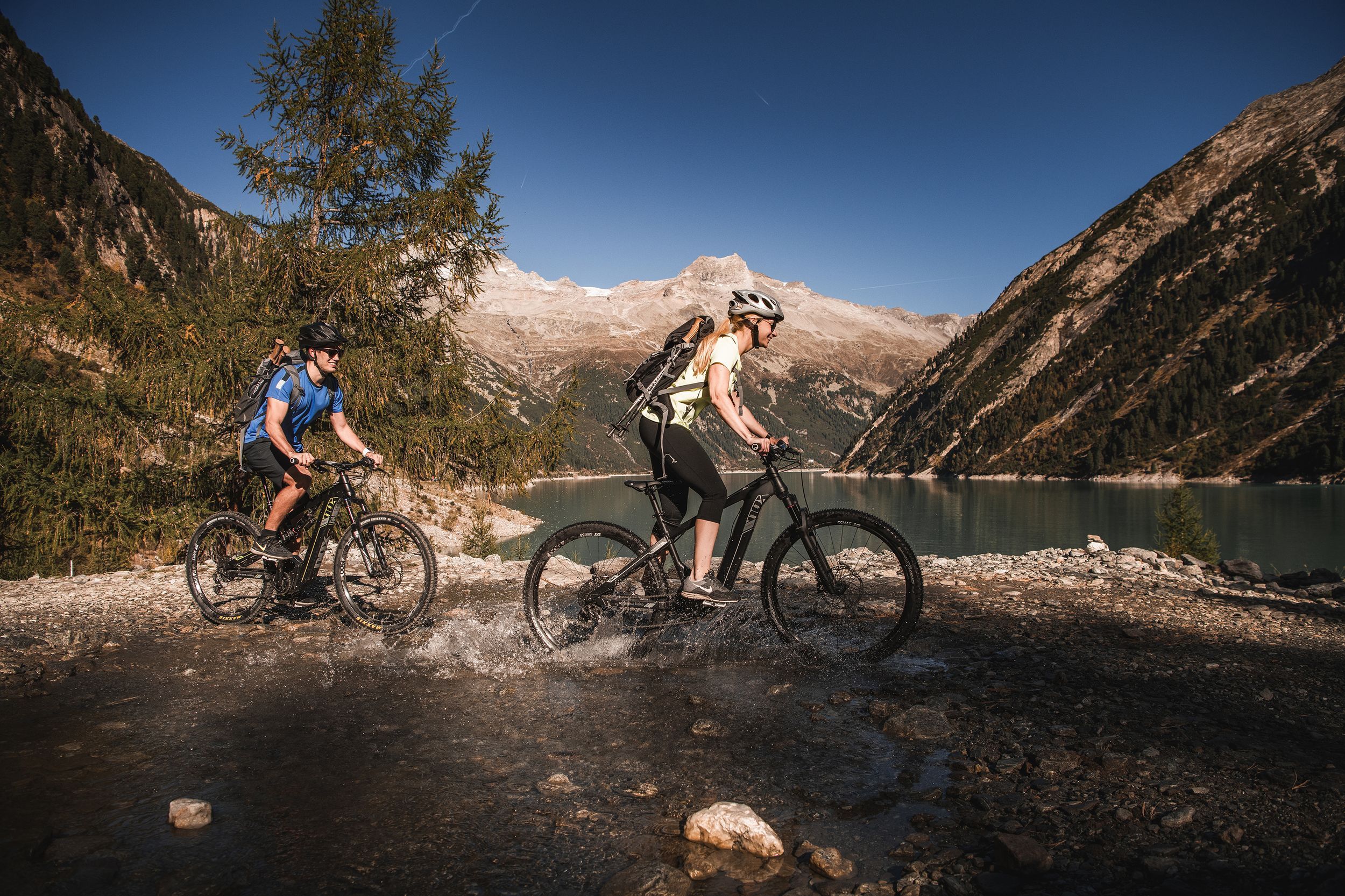 Hiking and Mountain Biking: Discovering Alpine Trails in Summer